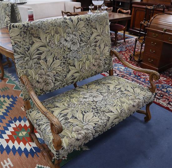 A Louis XVI style carved walnut three piece suite with tapestry upholstery